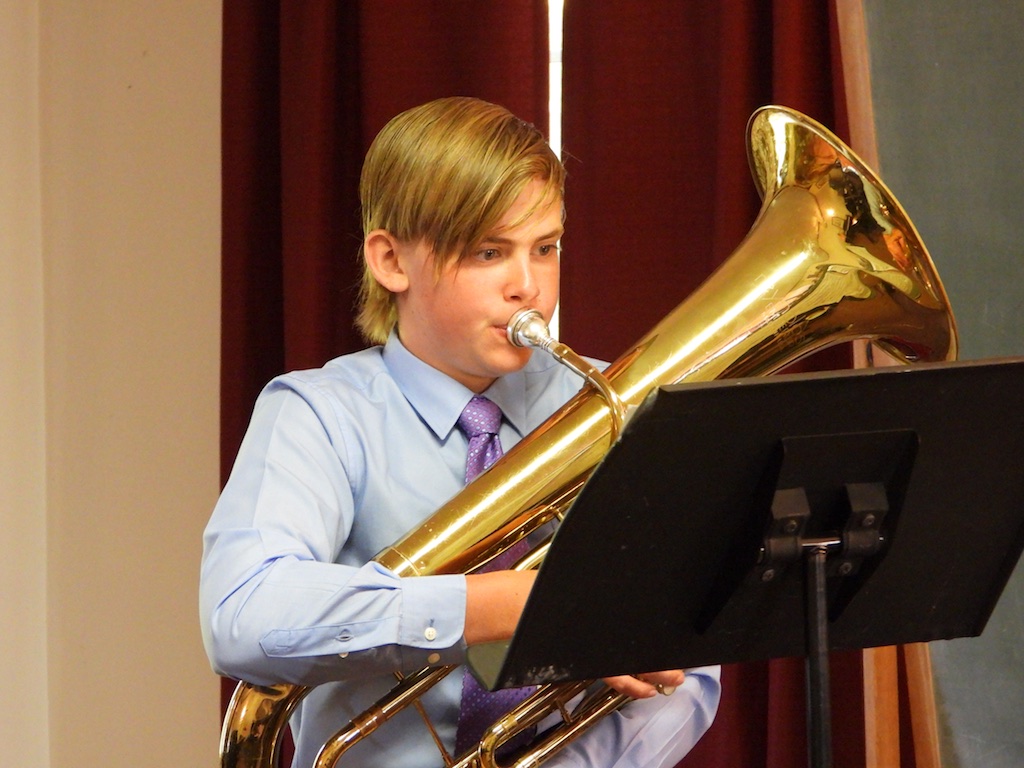 student playing brass instrument