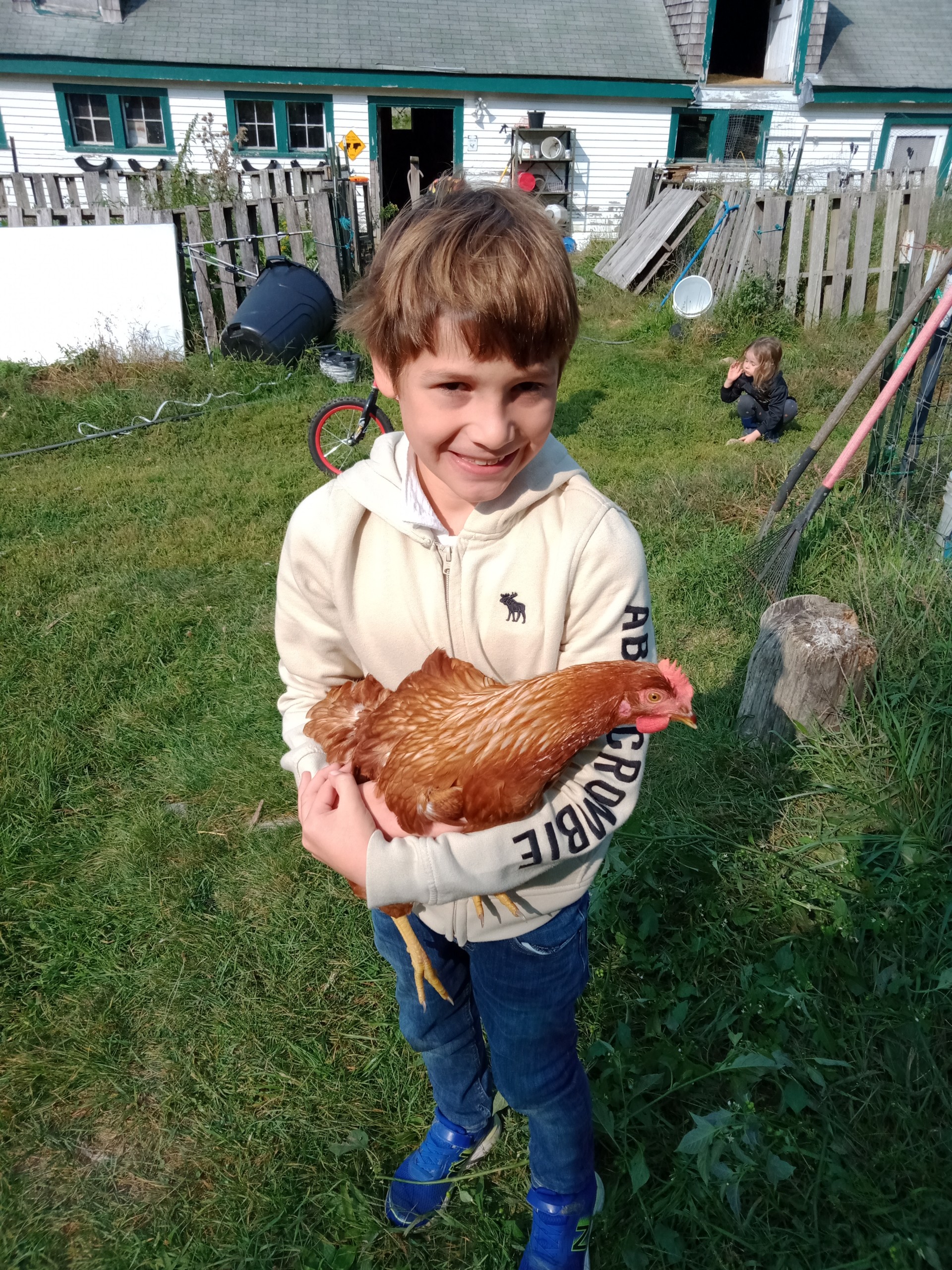student with chicken