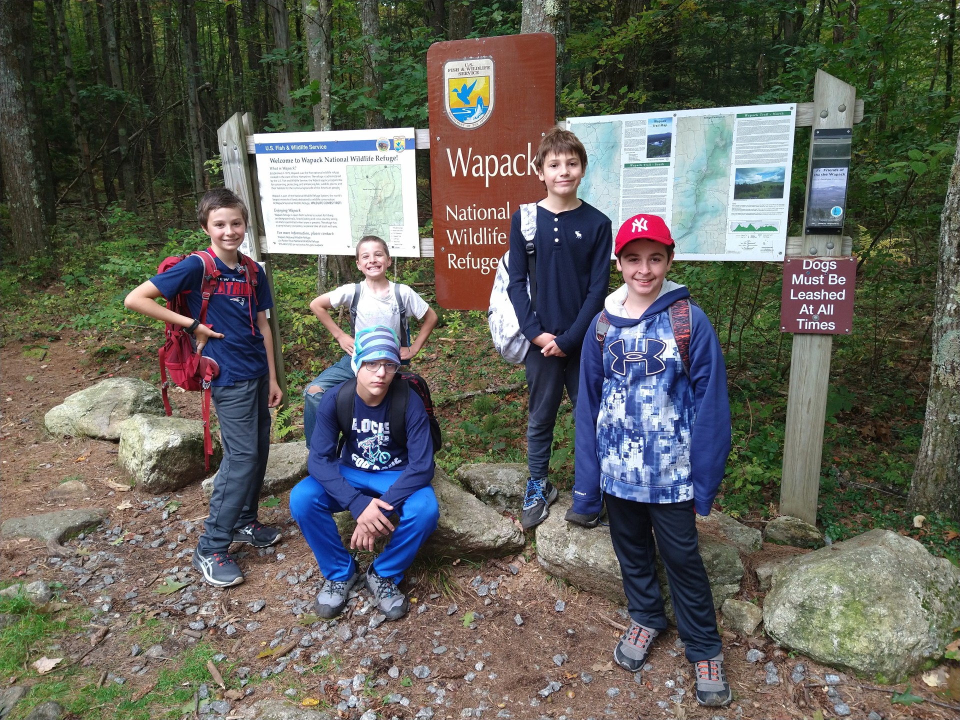 students hiking on the trails